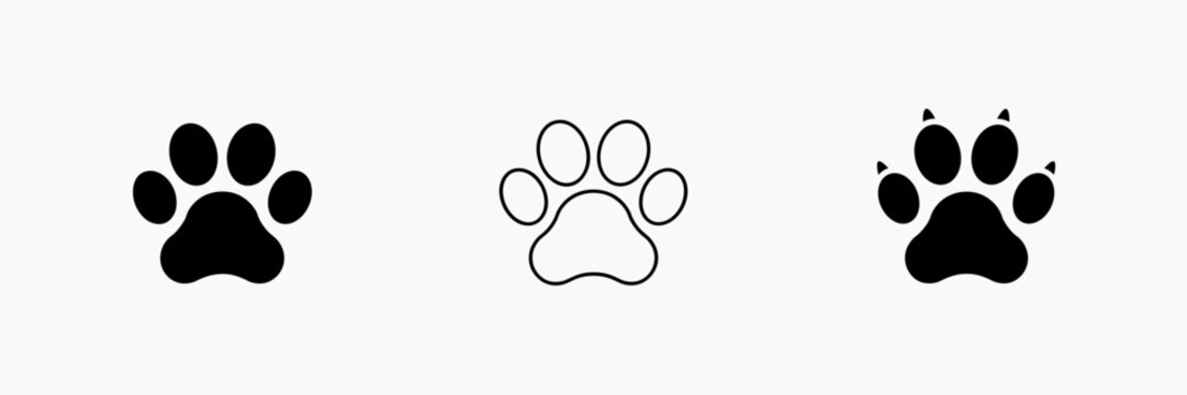 Three Stylized Paw Print Icons in Black and White Outline animal
