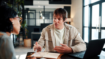 Creative, talking and business people in office for planning, marketing campaign and project ideas....