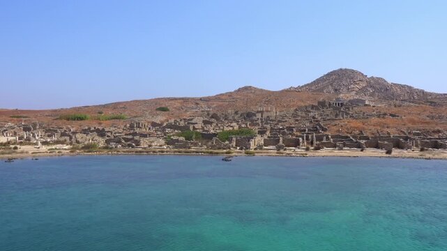 Archaeological site of Delos island in Greece from the Aegean sea