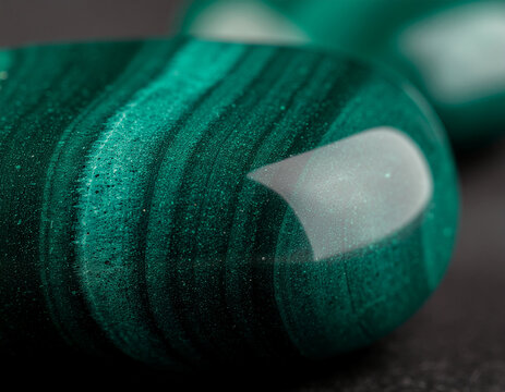 polished emerald stone surface with natural mineral veins and a premium abstract appearance