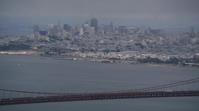 Storm Clouds Covering View Of San Francisco City Near Golden Gate Bridge Roadway - Aerial Shot