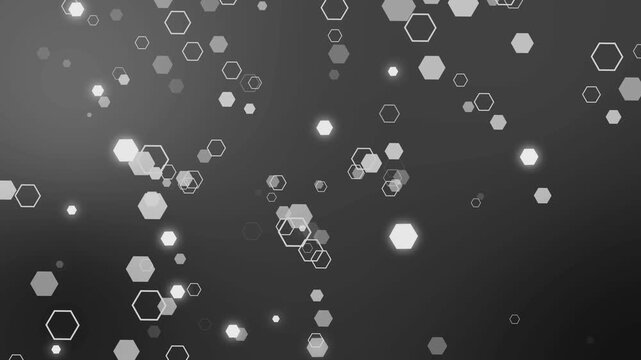 Abstract background with glowing hexagon shapes scattered across varying depths animation