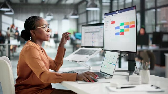 Human Resource Manager Reviews Employee Performance Data