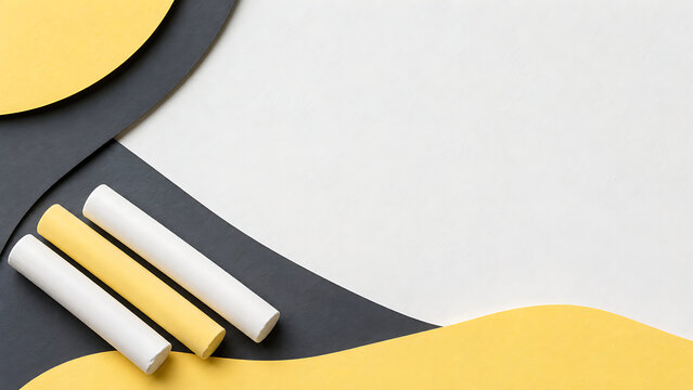Three cylindrical chalk sticks arranged on a background, of overlapping yellow, black, and white
