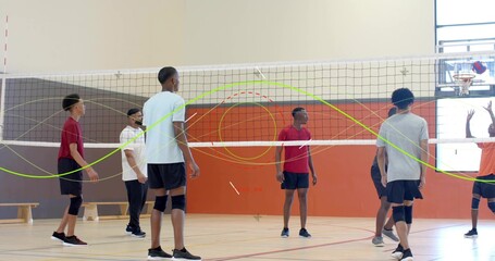 Volleyball player near net tracking ball from right, team moving, arc tracing ball showing rally © vectorfusionart