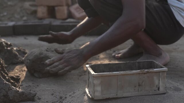 Indian man working at bricks factory 