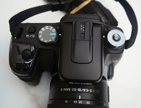 Sony Alpha DSLR camera on white background
