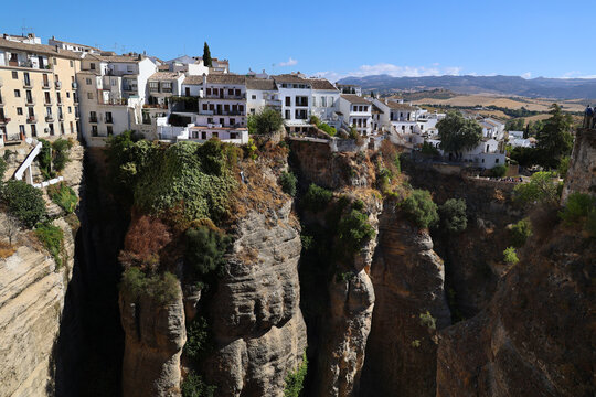 A glimpse of the beautifully situated city of Ronda in Andalusia, Spain, perched on the edge of the R&iacute;o Guadalev&iacute;n gorge