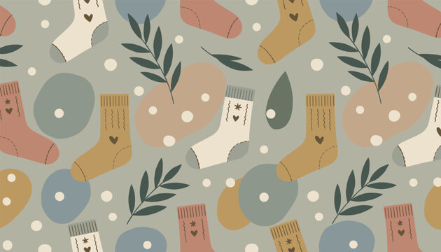 Cozy winter pattern with warm socks leaves and abstract shapes