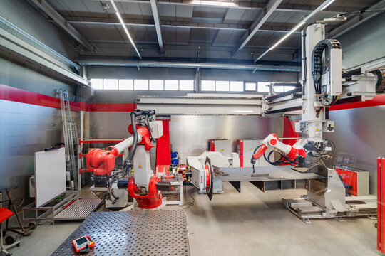 Automated robotic arms in a modern industrial factory