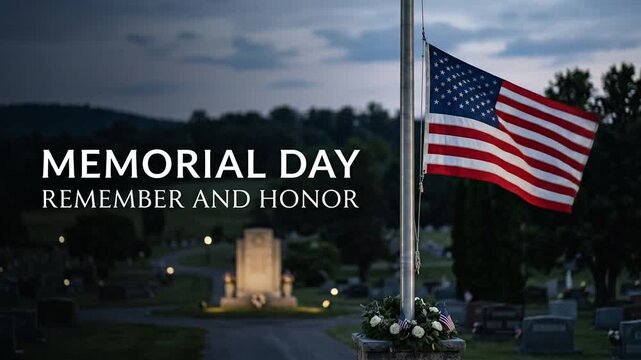 American flag at half staff in cemetery for Memorial Day at dusk