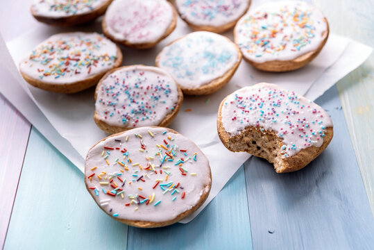 Vegan sweet pastry with sugar icing and coloured sugar beads and granules