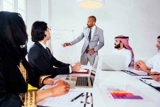 Business team attending a presentation in a Riyadh office