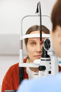 Patient undergoing vision diagnostics test at clinic