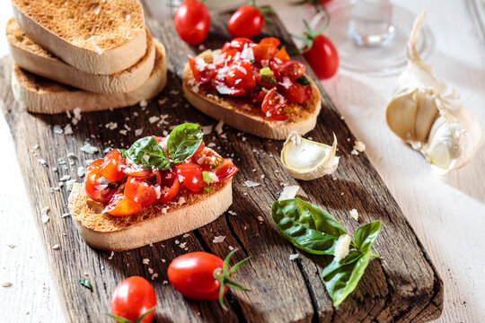 Italian buschetta on chopping board