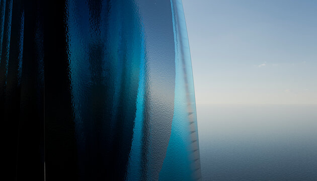 Abstract close up of blue fabric flowing in the wind