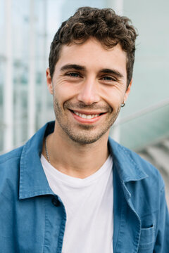 Portrait of smiling young man outdoors