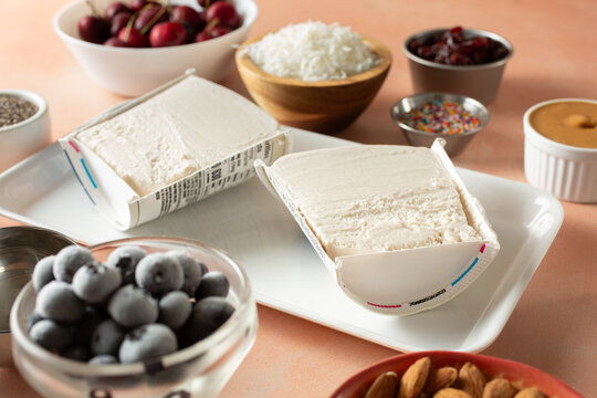 A view of a carton cut in half of dairy-free vanilla ice cream.