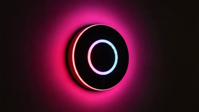 Smart light switch with colorful LED ring on dark wall  