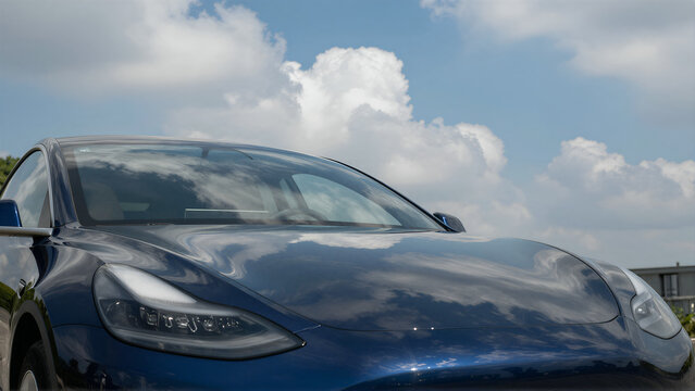 Tesla Model 3 Hood Reflection Sky