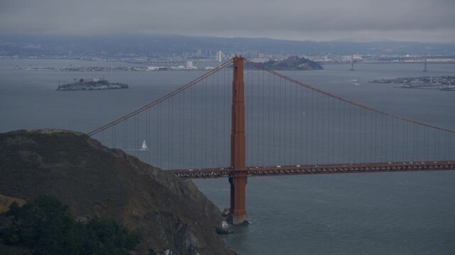 Golden Gate Bridge North Tower With View Of Sailboats, Alcatraz Island And Marin Headlands - High Shot