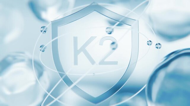 Menaquinone Vitamin K2 blue shield symbol in 3D animation. Calcium metabolism and bone health molecular structure background with transparent liquid cells for medical video