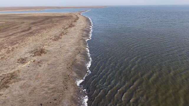 Kalmykia. Lake Manych-Gudilo. Waves on the shore.