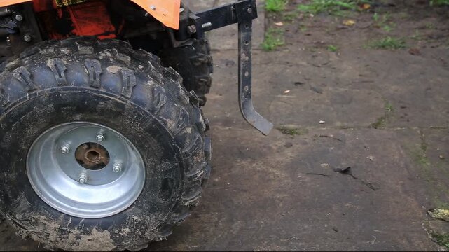 Forward and backward movement of the agricultural walk-behind tractor