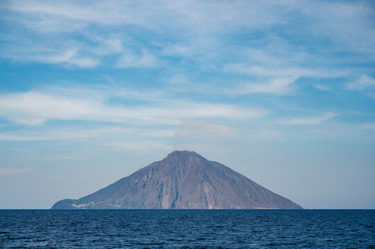 Breathtaking sunset over the Aeolian Islands. The island of Stromboli in all its magnificence between eruptions.