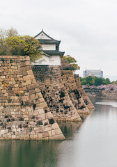 Stone Wall and Moat of Hiroshima Castle with a Corner Turret in Spring, Japan  © Pablo