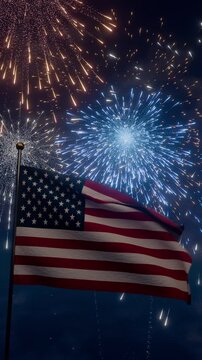 american flag fluttering in the wind against fireworks display at night sky