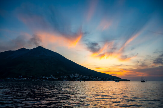 Breathtaking sunset over the Aeolian Islands. The island of Stromboli in all its magnificence between eruptions.