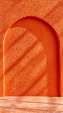 a minimalist, textured orange wall with an arched recess, highlighted by soft, angled sunlight and shadows.