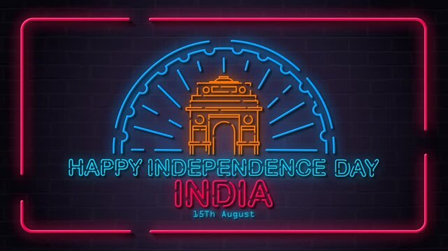 4K looping background featuring a glowing neon sign of India Gate with a half Ashoka Chakra wheel and "Happy Independence Day" typography on a dark brick wall. Ideal for celebratory event screens.