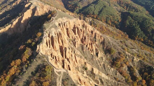 Aerial Sunset view of rock formation Stob pyramids, Rila Mountain, Kyustendil region, Bulgaria