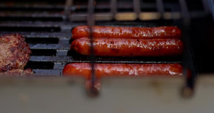 4th of July Barbecue Black Grill Cooking Grilling Meat Chicken Beef Hot Dogs Onions in Celebration of America USA 250th Birthday - in Cinema 4K 30fps Slowed From 120fps