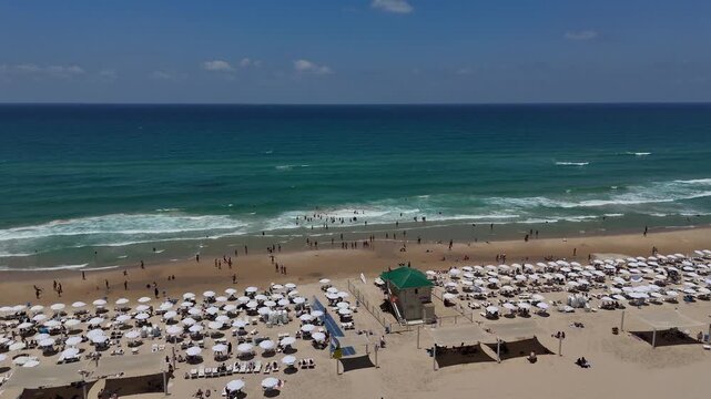 rishon lezion, israel, beach, aerial view, drone shot, 4k resolution, slow motion, panorama, mediterranean sea, crowded beach, summer vacation, friday afternoon, middle east, tlv area, coastline, sand