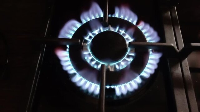 Wok Burner Gas Flame Ramping from Low Hiss to Roaring Jet with Sudden Shutoff -- Close-up on High-Output Burner During Full Cycle