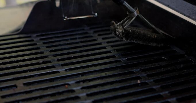 4th of July Barbecue Black Grill being cleaned in Celebration of America USA 250th Birthday - in Cinema 4K 30fps Slowed From 120fps