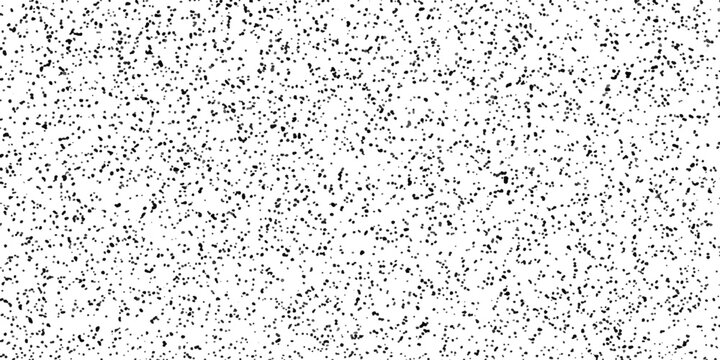 A speckled pattern of random black dots on a white background creates a textured visual, resembling static or a grainy effect.