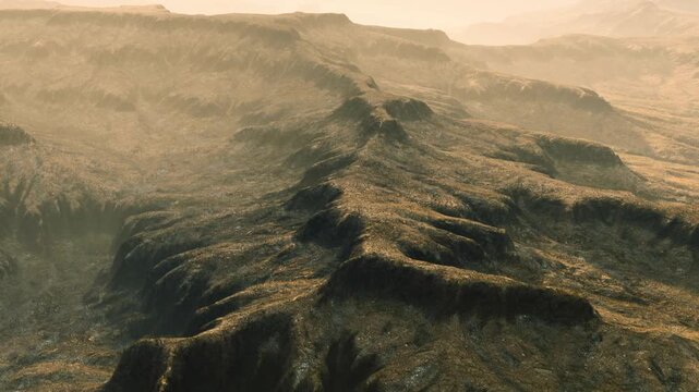A view shows a mountain range with various shapes and textures. Sunlight casts shadows on the land, creating a contrast in colors. The scene captures the beauty of nature at dusk.