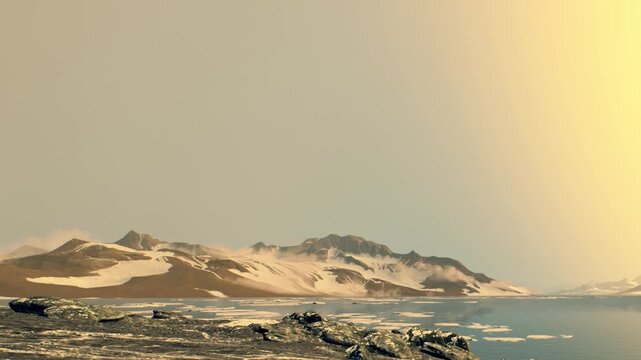The view shows a large body of water with ice floating. Mountains with snow are in the background. The sky has a yellow hue, suggesting the time is near sunset.