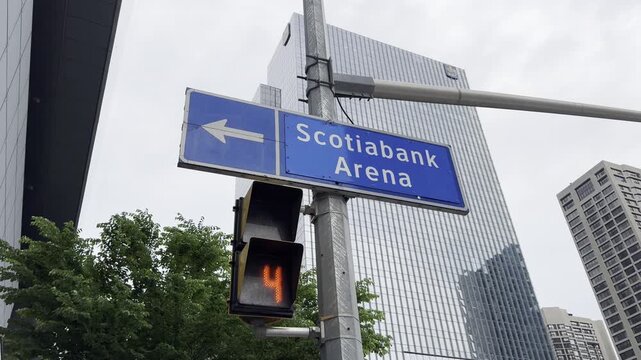 Beautiful view of the city of Toronto, Canada. Traffic signal countdown to Scotiabank Arena direction
