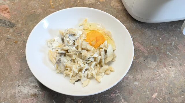 mix boiled cod fish with raw egg