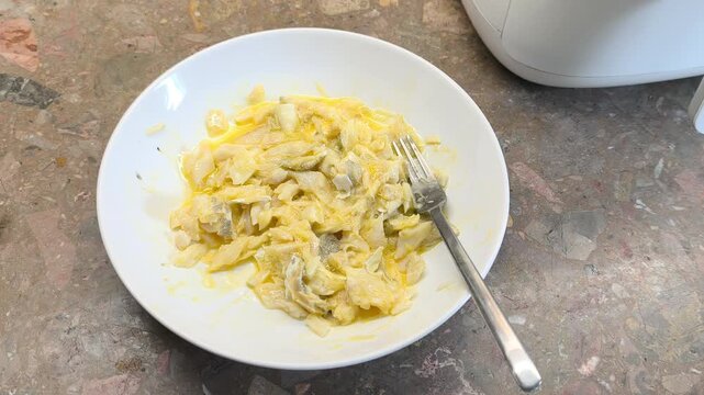 mix boiled cod fish with raw egg