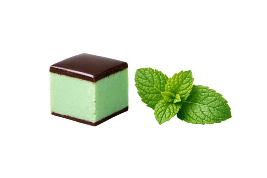 Mint chocolate cube dessert with smooth green filling and glossy dark chocolate layers, isolated on transparent background, shown with fresh mint leaves.