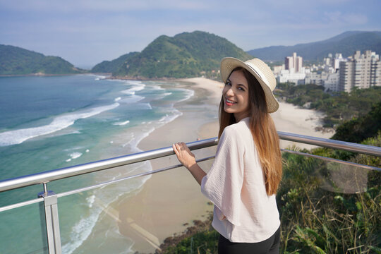Tourism in Brazil. Portrait of tourist girl on belvedere in Guaruja, Sao Paulo State, Brazil.