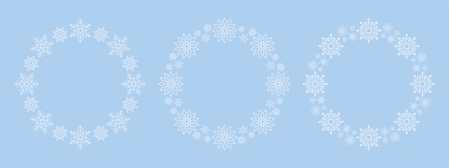 Set of circle frames made of intricate snowflakes. Decorative winter borders and festive Christmas wreaths for greeting cards, invitations, and seasonal branding templates © Svitlana