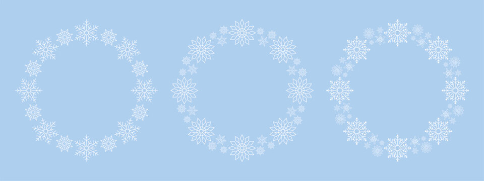 Set of circle frames made of intricate snowflakes. Decorative winter borders and festive Christmas wreaths for greeting cards, invitations, and seasonal branding templates