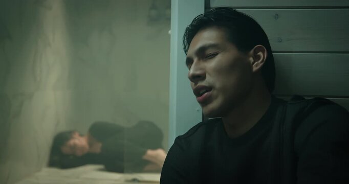 Depressed man sitting near bathroom wall, sad woman cry inside shower bath room. Couple quarrel ignoring problem. Relationship crisis, misunderstanding, loneliness concept. Family conflict break up.